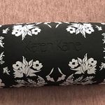 Karen Kane  Glass Case Photo 0