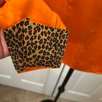 Robbie Bee  Luxury %100 silk button down with cheetah print cuffs! Photo 6
