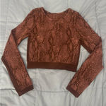 Maroon Snake Pattern Long Sleeve Cropped Athletic Top Red Photo 0