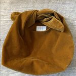 Merit Beauty The Signature Bag In Brown Photo 1