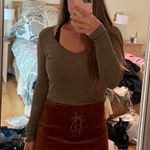 Buckle V-Neck Long Sleeve Top Photo 0