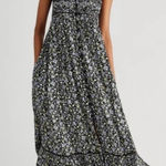 Free People  Molly Jo Midi Dress in a black floral print Photo 0