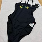 Tyr. Black One Piece Swimsuit with Yellow and Green Accents Photo 0