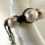 Pearl bracelet on adjustable black silk cord Photo 4