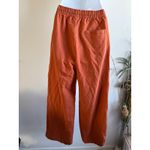 Nike  Women's Orange Nylon Drawstring Waist Wide Leg Track Pants Size XS Photo 3
