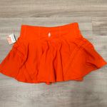 Free people movement skort, NWT! Orange Size M Photo 1
