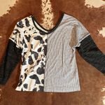 Amazon Cow print top from  size medium Photo 0