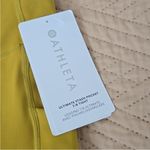 Athleta NWT  ultimate stash 7/8 pocket leggings mustard yellow gold xs Photo 2