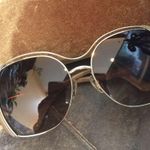 Miu Miu Sunglasses Photo 0