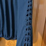 XOXO  Black Blouse with Elegant Detailing Photo 4