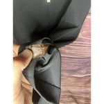 Calvin Klein Black Dress Size 2 Fitted with 3/4 Bell Sleeve With gold Rings. Photo 7