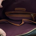 Adrienne Vittadini black leather purse with brown accents. Used good condition. Photo 2