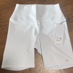 Alo Yoga NWT  Women's White Bike Shorts 7” size small and Medium Photo 0