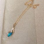 High heel gold tone necklace Photo 0
