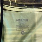 Nike Pro zip front shirt size M Photo 1