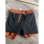 Alphalete  Woman’s Infinity Stride Short W/ Liner - Sour Tangerine, Size Small Photo 11