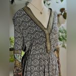 Lulumari Bohemian Patterned Romper with Flared Sleeves Photo 2