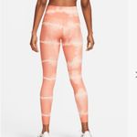 Nike  One Luxe Dri-Fit Mid-Rise Orange Tie Dye Training Leggings. Size XS… Photo 1