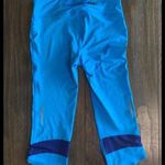 Under Armour  UA blue/purple Compression Capri leggings Size S Photo 1