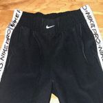 Nike  Pro tear away women's Black  Track Pants Side Logo Stripe Size S BV3350 Photo 2
