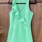 Likely green asymmetrical ruffle lined romper S Photo 1