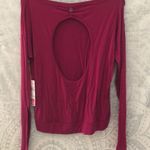 Keara long sleeve top with open back detail. Photo 1