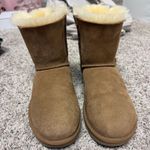 UGG  Women’s Mini Bailey Bow II Boots Chestnut Photo 1