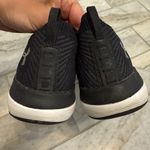 Under Armour women's size 9 Black sneakers ONCE WORN ONLY! Photo 2