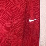 Nike Dri Fit red patterned cropped athletic leggings Photo 3