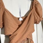 Chic Mable Tan Jumpsuit with crisscross open midriff with tie back. Size M Photo 8