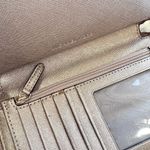 Michael Kors Jet Set Travel Metallic Leather Smartphone Wristlet in Pale Gold Photo 3