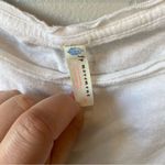 Free People FP Movement by Hold It Down Yellow Dip Dye Knot Hem Crop T-Shirt Photo 6