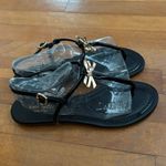 Kate Spade Size 8.5 Tracie Sandals Black Patent Gold Bow T Strap TINY FLAW Photo 2