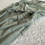 Athleta Revive Jumpsuit Laurel Olive Green Drawstring Parachute Pant Size 6 Photo 10