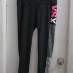 Victoria's Secret VSX sport knockout tight leggings in black, white and pink size medium. Photo 0