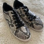 These Three Boutique Sneakers Photo 0