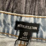 Pretty Little Thing Distressed Light Blue Boyfriend style Jeans size 10 by  Photo 3
