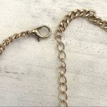 Gold tone black beaded triangle necklace Photo 9