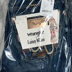 NWT x Wrangler x Lainey Wilson Wildflower Embroidered Jeans In Boho Wash $128 MSRP 25 L 27 L New in poly bag from free people Sold Out On Free People No refund or cancellations Photo 8