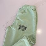 The Mayfair Group IT COST $0 TO BE A NICE PERSON Sweatpants Green Photo 7