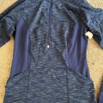 Lucy Activewear Blue half zip long sleeve top with thumb holes and arm zip pocket Photo 2
