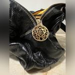 Tous Teddy Bear Charm Black
Leather Bling Clasp Handbag Purse
Gold metal lining Photo 6