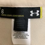 Under Armour  loose fit woman golf style shorts size 6 khaki color Photo 5