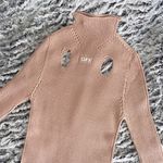 Off-White Holy Cutout Ribbed Long Sleeve Mock Neck Sweater In Nude Photo 6