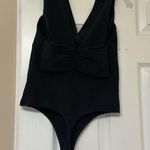 EXPRESS RIBBED PLUNGE NECK BOW BACK THONG BODYSUIT Photo 5