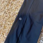 Lululemon Athletics Crops Black Leggings with green stripe Size 2 excellent cond Photo 3