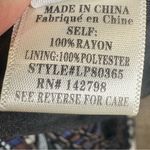 Blush Boutique long sleeve open back geometric print romper size large Photo 8