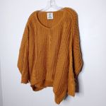 Unif  × Urban Outfitters burnt orange sweater size small Photo 1