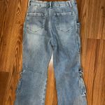 Insane Gene size 9 stretchy jeans. 5 front cargo pockets. Flares. 31 inch inseam Photo 4