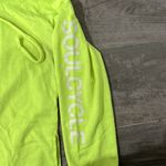 Soul Cycle neon yellow sweatshirt. Photo 4